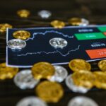 selective-focus-photo-of-silver-and-gold-bitcoins